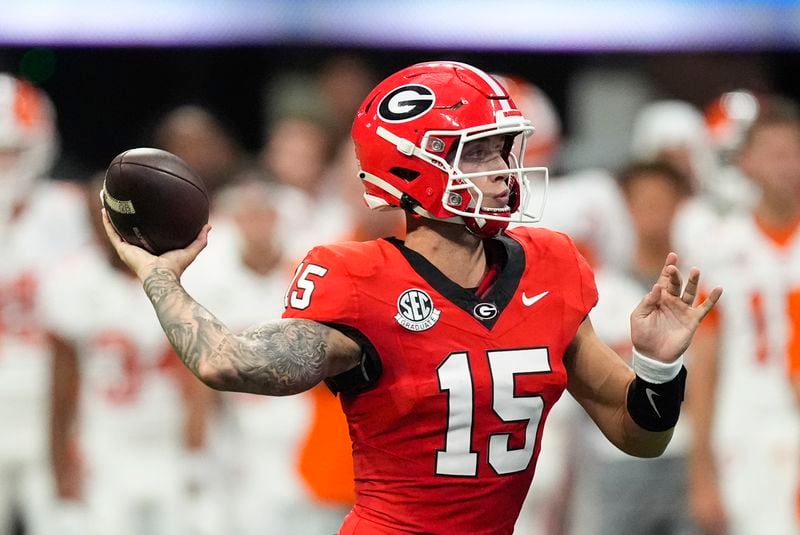 Georgia quarterback Carson Beck throws a pass during the first half of an NCAA college football game against Clemson Aug. 31, 2024, in Atlanta. (AP Photo/John Bazemore)