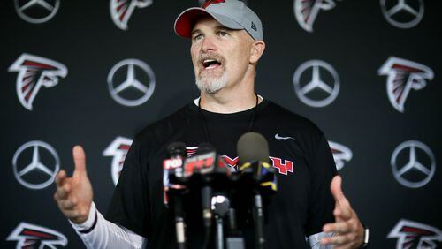 Atlanta Falcons head coach Dan Quinn talks to reports during training camp, Saturday, July 28, 2018, in Flowery Branch, Ga.  BRANDEN CAMP/SPECIAL