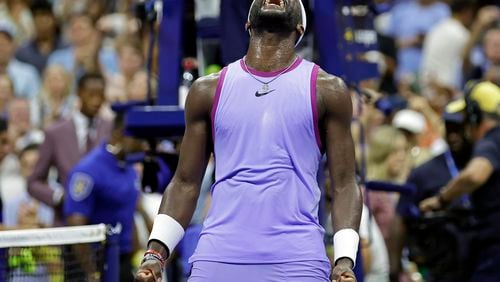 Frances Tiafoe, of the United States, reacts after defeating Alexei Popyrin, of Australia, during the fourth round of the U.S. Open tennis tournament Sunday, Sept. 1, 2024, in New York. (AP Photo/Adam Hunger)