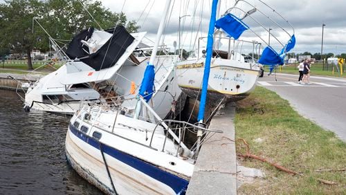 Boats destroyed during Hurricane Helene are shown on the Davis Islands Yacht Basin ahead of the possible arrival of Hurricane Milton Monday, Oct. 7, 2024, in Tampa, Fla. (AP Photo/Chris O'Meara)