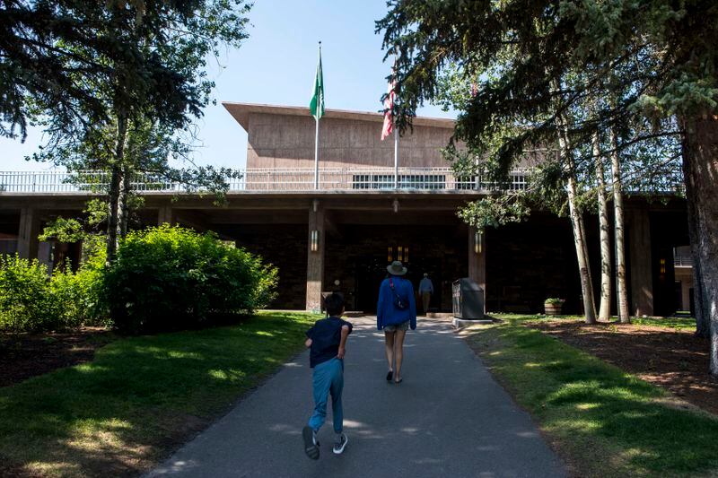 Guests approach Jackson Lake Lodge, the site of the Jackson Hole Economic Symposium, in Grand Teton National Park near Moran, Wyo., on Thursday, Aug. 22, 2024.