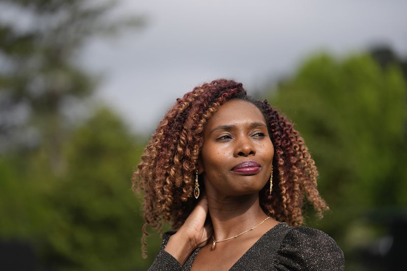Culix Wibonele poses for a portrait on Monday, April 29, 2024, in Lawrenceville, Ga. Wibonele is a certified nursing assistant working in long-term care. (AP Photo/Brynn Anderson)