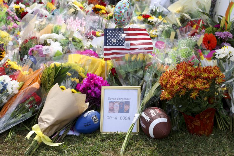 A memorial outside Apalachee High School, where a shooter killed two students and two teachers on Sept. 4.