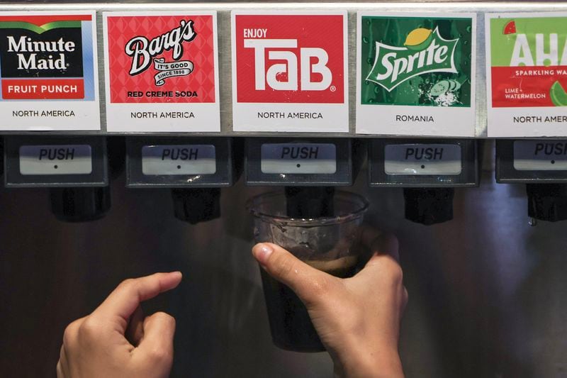One of only a handful of places in the world to actually get fresh Tab soda is at The World of Coca Cola museum in the drink sample room. Coca Cola stopped making Tab available in retail stores in 2020. This shot was taken Tuesday, Nov. 7, 2023. (Natrice Miller/ Natrice.miller@ajc.com)