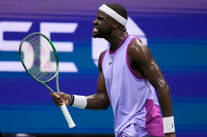 Frances Tiafoe, of the United States, reacts after scoring a point against Taylor Fritz, of the United States, during the men's singles semifinal of the U.S. Open tennis championships, Friday, Sept. 6, 2024, in New York. (AP Photo/Frank Franklin II)