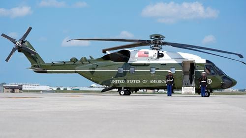 A new Marine One awaits President Joe Biden at Chicago O'Hare International Airport in Chicago, Monday, August 19, 2024. Biden on Monday took his first flight aboard the modern VH-92A helicopter that serves as Marine One after years of delays to the program to replace the aging aircraft that carry the president and vice president. Biden boarded the Sikorsky-made helicopter after arriving on Air Force One in Chicago where he is speaking Monday evening at the Democratic National Convention. (AP Photo/Stephanie Scarbrough)