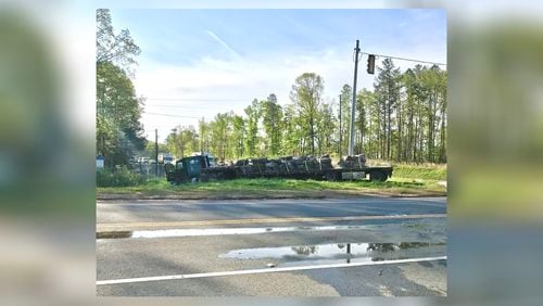 Ga. 108 in Cherokee County remains shut down Friday morning as deputies investigate a fatal wreck involving a tractor-trailer and an SUV.