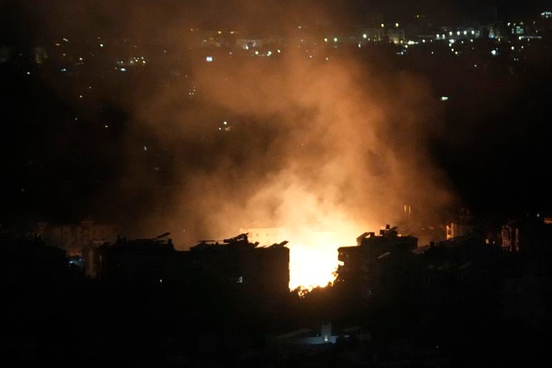 Flame and smoke rise from an Israeli airstrike in Dahiyeh, Beirut, Lebanon, Monday, Oct. 7, 2024. (AP Photo/Hussein Malla)