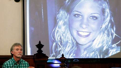 Dana Bobo, father of Holly Bobo, testifies in the trial of Zach Adams as a photo of Holly is displayed in Savannah, Tennessee. Jason Autry pleaded guilty Monday to taking part in the killing more than nine years ago, but he is expected to be released soon as part of a deal with prosecutors. (AP file photo)