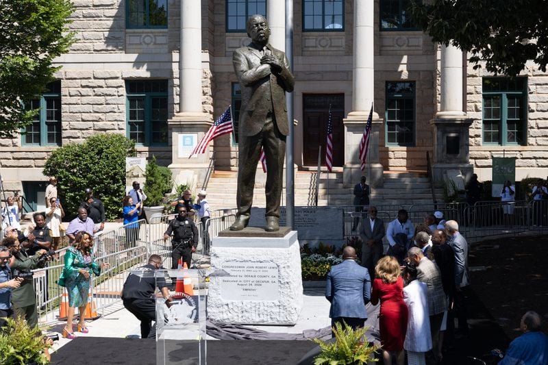 A statue of the late Democratic Congressman John Lewis was unveiled in Decatur on Saturday.