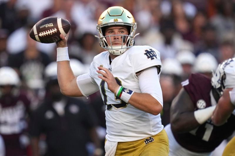 Notre Dame quarterback Riley Leonard (13) passes the ball against the Texas A&M during the first half of an NCAA college football game Saturday, Aug. 31, 2024, in College Station, Texas. (AP Photo/Sam Craft)