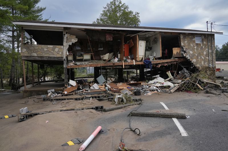 A flood damaged building left by tropical depression Helene is seen in Newport, Tenn., Saturday, Sept. 28, 2024. (AP Photo/George Walker IV)