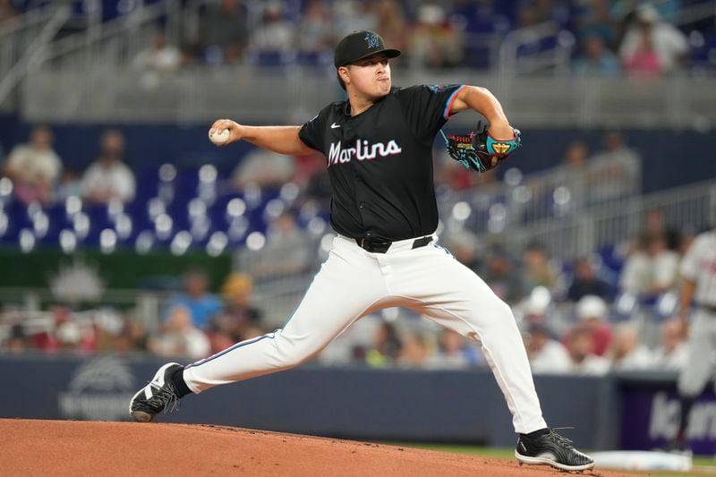 Miami Marlins pitcher Valente Bellozo (83) aims a pitch during the first inning of a baseball game against the Atlanta Braves, Friday, Sept. 20, 2024, in Miami. (AP Photo/Marta Lavandier)