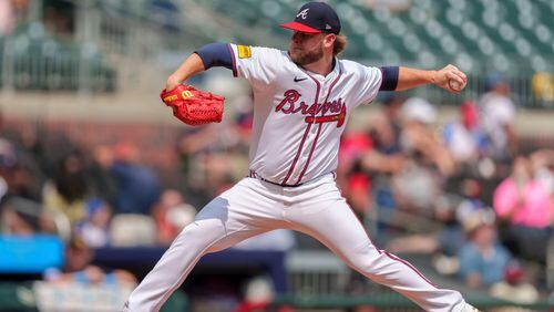 Atlanta Braves pitcher A.J. Minter throws in the ninth inning of a baseball game against the Miami Marlins, Sunday, Aug. 4, 2024, in Atlanta. (AP Photo/Jason Allen)