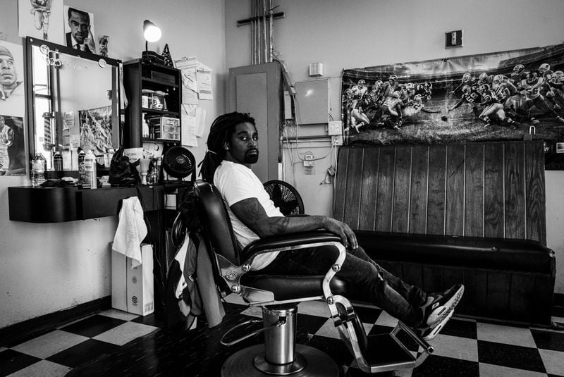 “Nate The Barber” posed in his chair at Pure Essence Barber Shop in Atlanta, GA. Photo by Antonio M. Johnson
Courtesy of Antonio M. Johnson