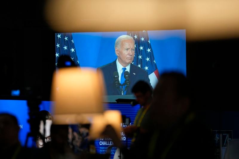 President Joe Biden's news conference is projected onto a screen inside the media center on the final day of the NATO Summit in Washington, Thursday, July 11, 2024. (Photo/Pablo Martinez Monsivais)