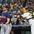 Atlanta Braves’ Matt Olson (28) strikes out and tagged by San Diego Padres catcher Kyle Higashioka (20) during the third inning of National League Division Series Wild Card Game One at Petco Park in San Diego on Tuesday, Oct. 1, 2024.   (Jason Getz / Jason.Getz@ajc.com)