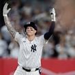 New York Yankees' Alex Verdugo reacts after driving in a run on a double against the Kansas City Royals during the seventh inning of Game 1 of the American League baseball division series, Saturday, Oct. 5, 2024, in New York. (AP Photo/Adam Hunger)