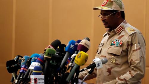 FILE -Gen. Mohammed Hamdan Dagalo, the deputy head of the military council speaks at a ceremony in the capital Khartoum, Sudan, Sunday, Aug. 4, 2019. Sudan's paramilitary leader has announced plans to attend ceasefire talks in Switzerland next month arranged by the United States and Saudi Arabia. (AP Photo, File)