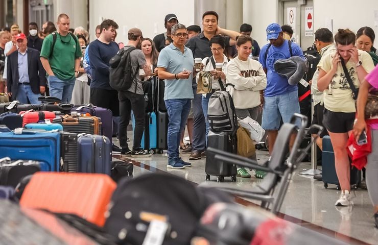 Day Four of airport woes for passengers