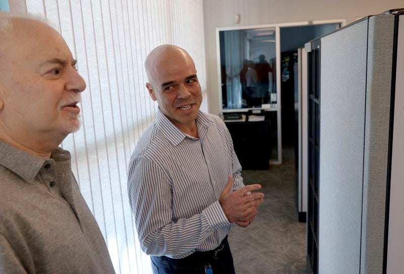 FILE - Clark County Public Administrator Robert Telles, right, talks to Las Vegas Review-Journal reporter Jeff German in his Las Vegas office, on May 11, 2022. (K.M. Cannon/Las Vegas Review-Journal via AP, File)