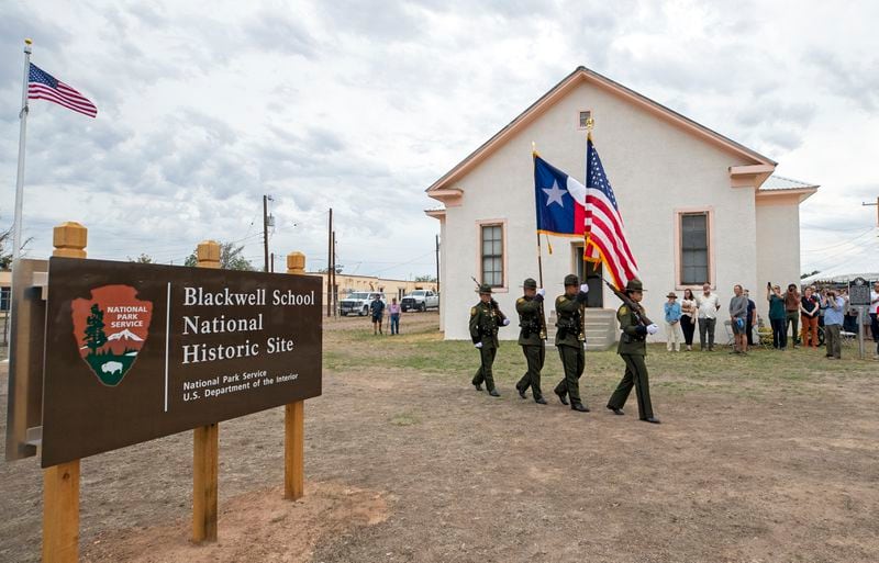 A Border Patrol color guard conducts the presentation of colors during the inauguration of Blackwell School as the newest National Historic Site in Marfa, Texas, Saturday, Sept. 14, 2024. (AP Photo/Andres Leighton)