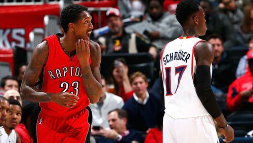 ATLANTA, GA - FEBRUARY 20: Louis Williams #23 of the Toronto Raptors reacts after hitting a three-point basket against Dennis Schroder #17 of the Atlanta Hawks at Philips Arena on February 20, 2015 in Atlanta, Georgia. NOTE TO USER: User expressly acknowledges and agrees that, by downloading and or using this photograph, User is consenting to the terms and conditions of the Getty Images License Agreement. (Photo by Kevin C. Cox/Getty Images)