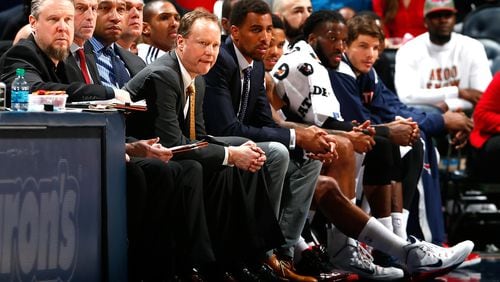 FILE APRIL 21: The Atlanta Hawks head coach Mike Budenholzer has been named the 2014-15 NBA Coach of the Year, finishing ahead of Golden State Warriors head coach Steve Kerr on April 21, 2015. Budenholzer led the Hawks to their first 60-win season in franchise history and the top seed in the Eastern Conference. ATLANTA, GA - FEBRUARY 20: Mike Budenholzer and the Atlanta Hawks bench look on during the final minutes of their 105-80 loss to the Toronto Raptors at Philips Arena on February 20, 2015 in Atlanta, Georgia. NOTE TO USER: User expressly acknowledges and agrees that, by downloading and or using this photograph, User is consenting to the terms and conditions of the Getty Images License Agreement. (Photo by Kevin C. Cox/Getty Images) Mike Budenholzer finished with 67 first-place votes to Steve Kerr's 56. (Kevin C. Cox, Getty Images)