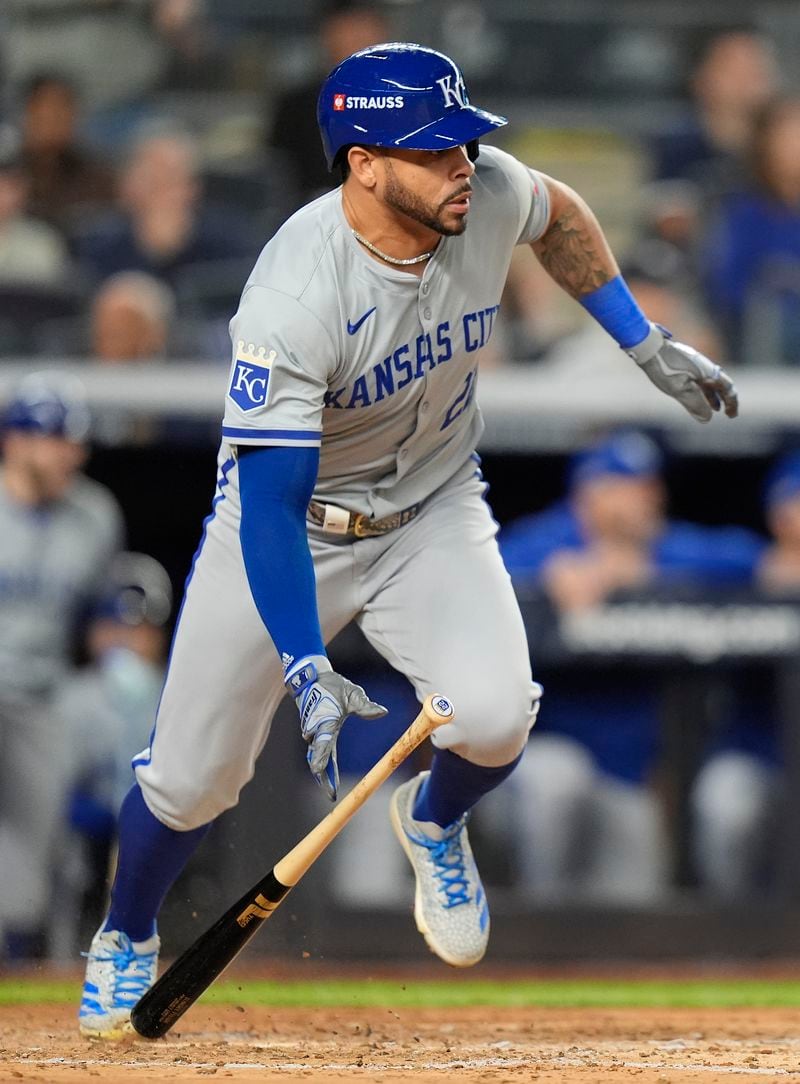 Kansas City Royals outfielder Tommy Pham (22) heads for first base on an RBI single against the New York Yankees during the fourth inning of Game 2 of the American League baseball playoff series, Monday, Oct. 7, 2024, in New York. (AP Photo/Frank Franklin II)