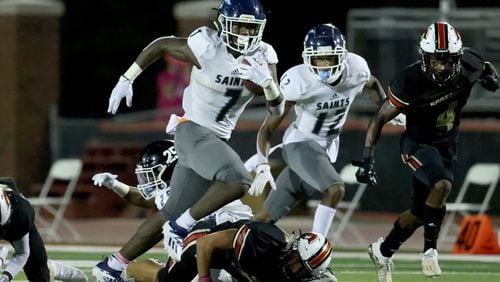 Cedar Grove running back Rashod Dubinion (7) runs for a long gain in the first half of Friday's game against GAC.