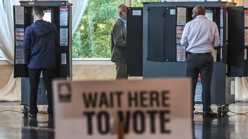 Georgia voters cast their ballots in the May 21 primary at Park Tavern in Midtown Atlanta. (John Spink/The Atlanta Journal-Constitution)