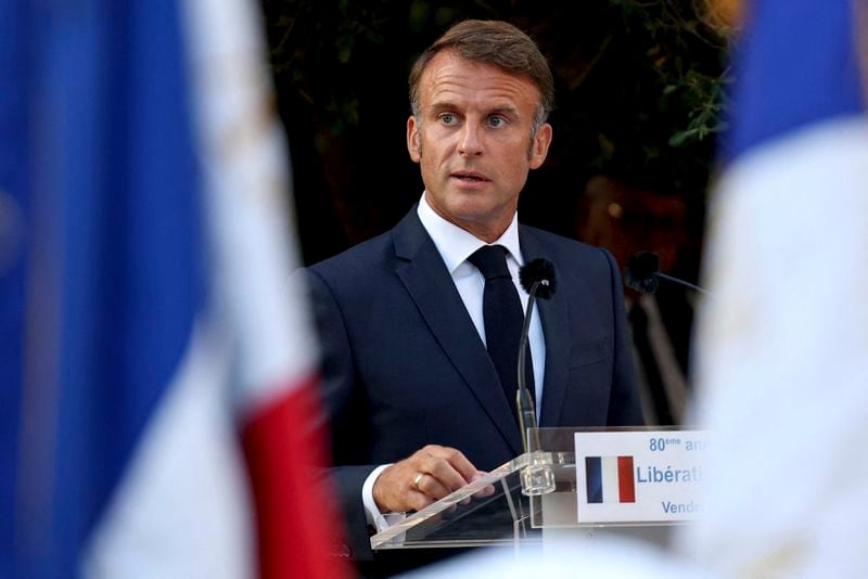 French President Emmanuel Macron speaks during a ceremony to commemorate the 80th anniversary of the liberation of the village Bormes-les-Mimosas during World War II, south-eastern France, Saturday, Aug. 17, 2024. (Manon Cruz, Pool via AP, File)