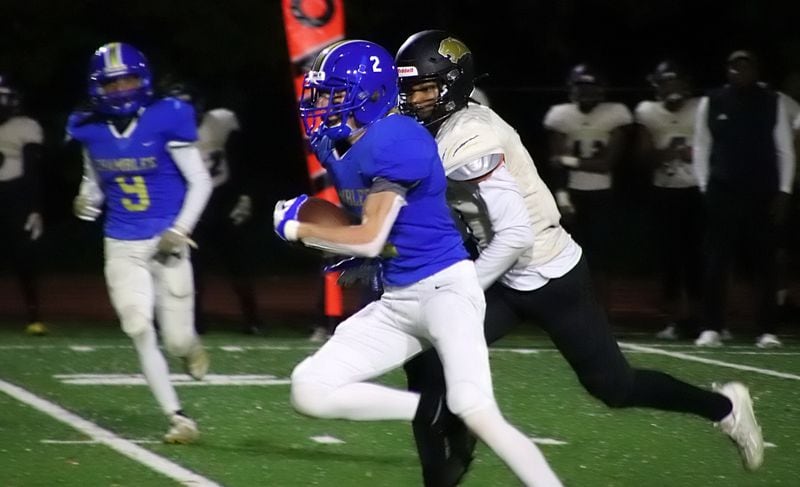 Jason Lynch returns one of six Chamblee interceptions in a 21-0 win over Liberty County. The Bulldogs forced nine turnovers.