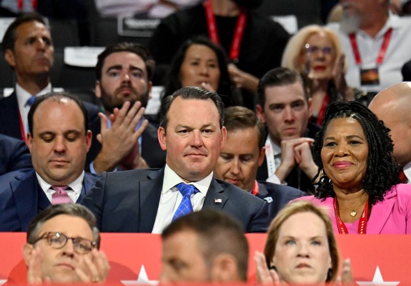 Georgia Lt. Gov. Burt Jones (blue tie) attends the third day of the Republican National Convention in Milwaukee.