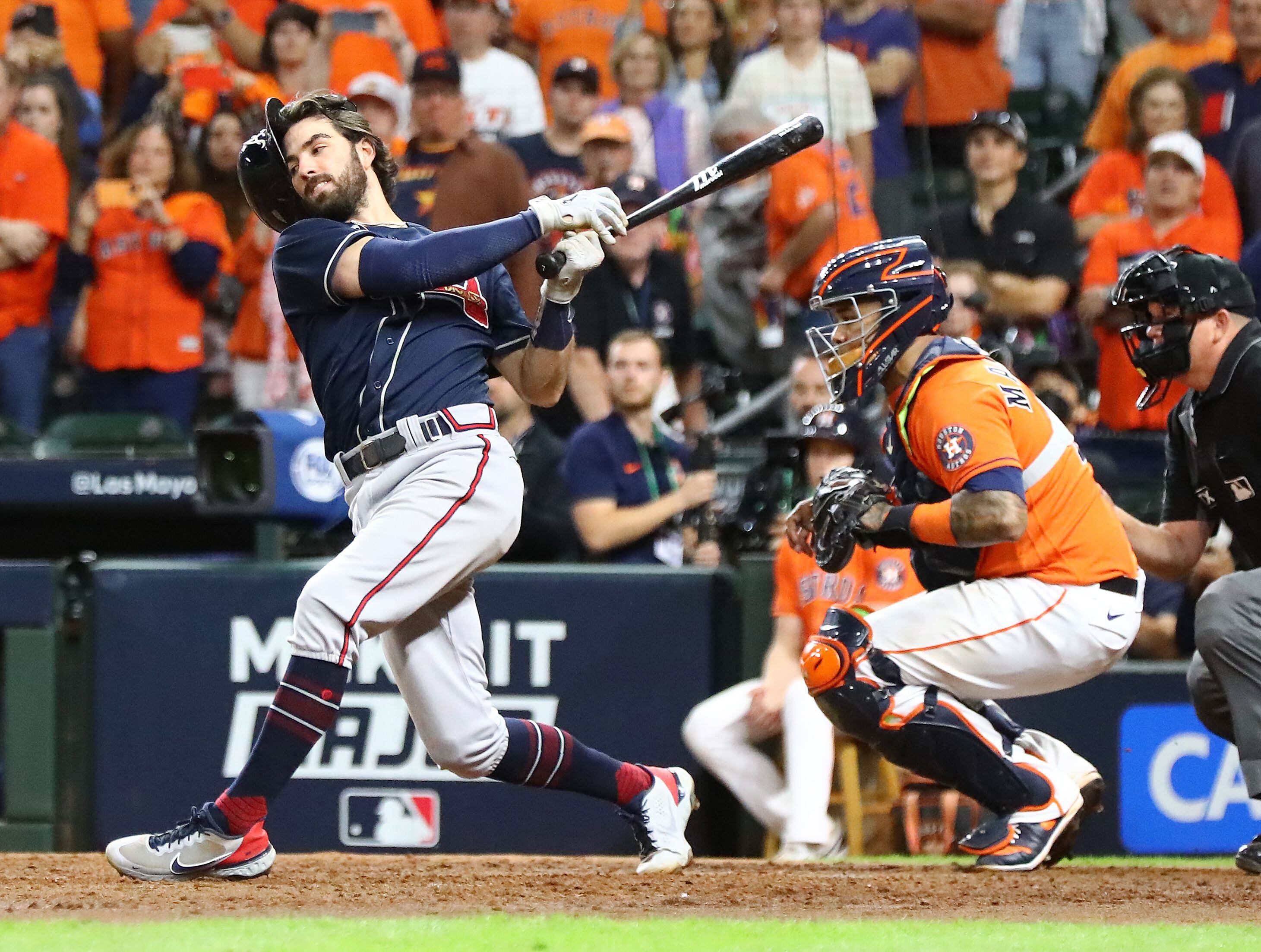 Houston Astros' Kyle Tucker is safe at second on a fielding error by  Atlanta Braves second baseman Ozzie Albies during the sixth inning in Game  2 of baseball's World Series between the