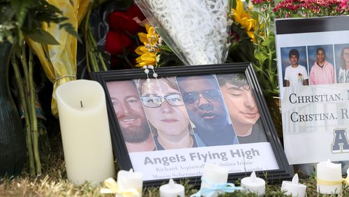 A memorial with images of the those killed are from left to right; Richard “Ricky” Aspinwall, Cristina Irimie, Mason Schermerhorn, and Christian Angulo at a memorial at Apalachee High School, Friday, Sept. 6, 2024, in Winder, Ga. A 14-year-old Apalachee student is accused of shooting and killing two fellow students and two teachers and injuring nine others at Apalachee High School on Wednesday. (Jason Getz / AJC)