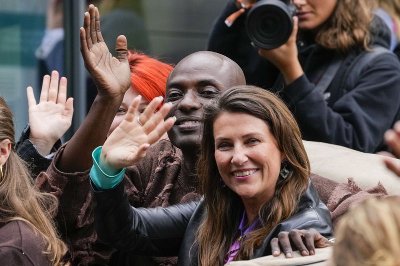 Norway's Princess Martha Louise and Durek Verret and guests arrive from Alesund to Geiranger, Norway, Friday Aug. 30, 2024, ahead of their wedding celebration on Saturday. (Cornelius Poppe/NTB via AP)