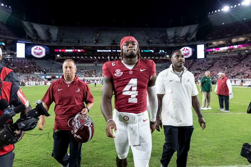 Alabama quarterback Jalen Milroe (4) walks off the field with a victory after an NCAA college football game against South Florida, Saturday, Sept. 7, 2024, in Tuscaloosa, Ala. (AP Photo/Vasha Hunt)