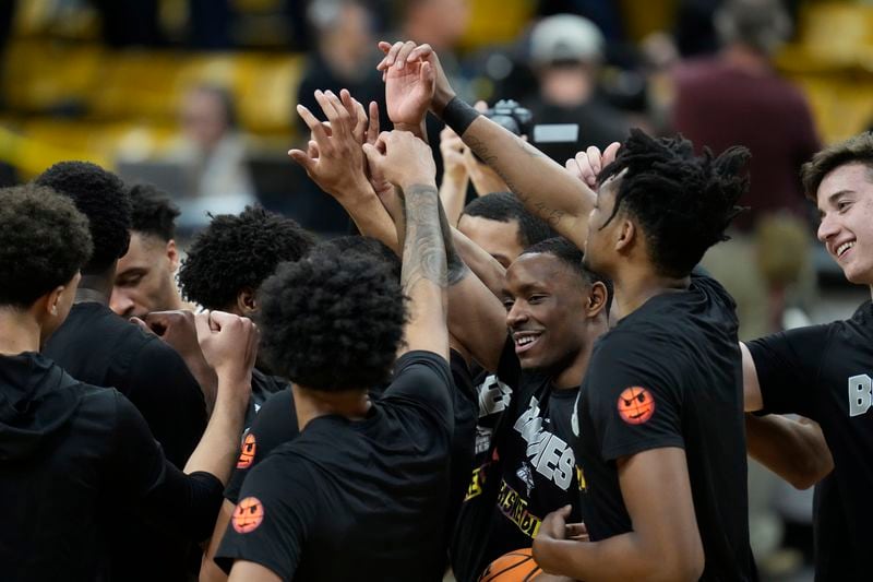 FILE - St. Bonaventure players huddle in the first half of a National Invitational Tournament basketball game on Tuesday, March 15, 2022, in Boulder, Colo. (AP Photo/David Zalubowski, File)