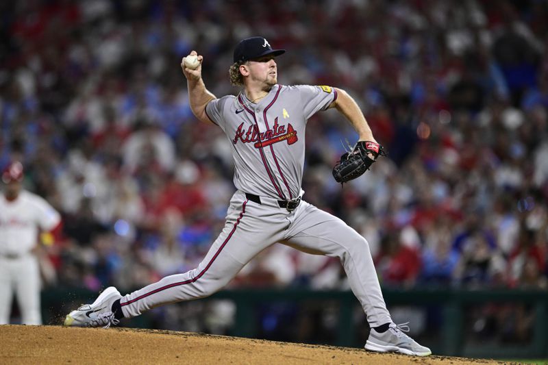 Atlanta Braves' Spencer Schwellenbach throws during the fourth inning of a baseball game against the Philadelphia Phillies, Sunday, Sept. 1, 2024, in Philadelphia. (AP Photo/Derik Hamilton)