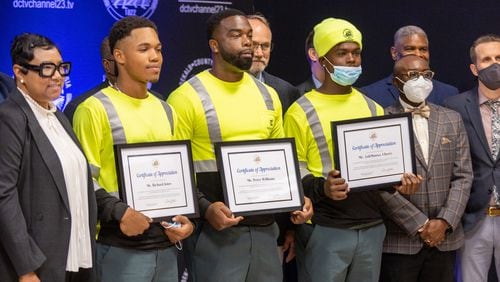  Sanitation Division employees were recognized for saving a 16-year-old female teenager from the hopper At the DeKalb county board of commissioners' first in-person meeting in Decatur Tuesday, Oct. 25, 2022 Steve Schaefer/steve.schaefer@ajc.com)