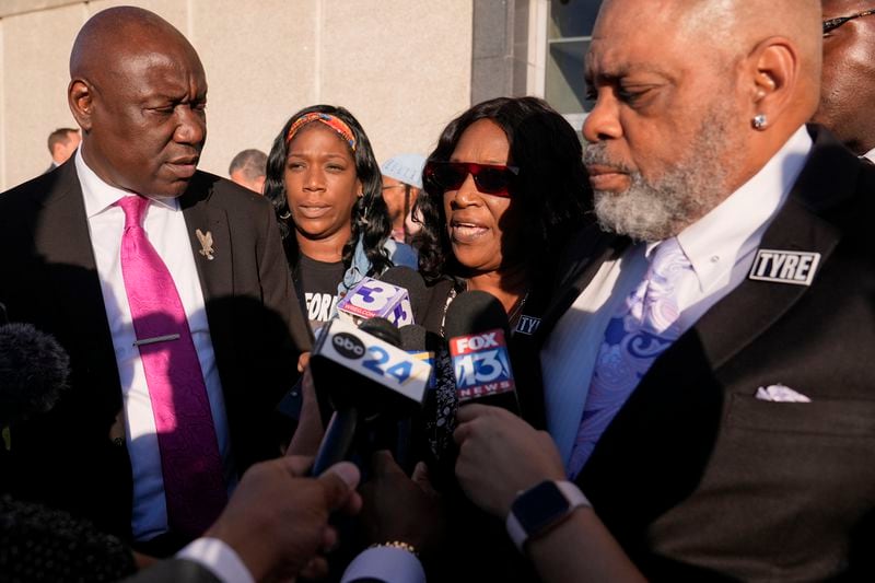 RowVaughn Wells, second from right, mother of Tyre Nichols, speaks during a news conference outside the federal courthouse after three former Memphis police officers were convicted of witness tampering charges in the 2023 fatal beating of Nichols, Thursday, Oct. 3, 2024, in Memphis, Tenn. (AP Photo/George Walker IV)