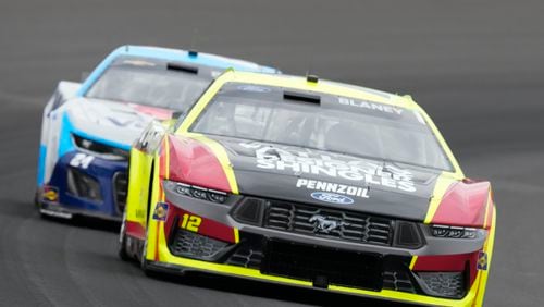 Ryan Blaney drives during the NASCAR Cup Series auto race at Indianapolis Motor Speedway, Sunday, July 21, 2024, in Indianapolis. (AP Photo/Darron Cummings)