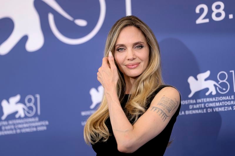 Angelina Jolie poses for photographers at the photo call for the film 'Maria' during the 81st edition of the Venice Film Festival in Venice, Italy, on Thursday, Aug. 29, 2024. (Photo by Vianney Le Caer/Invision/AP)