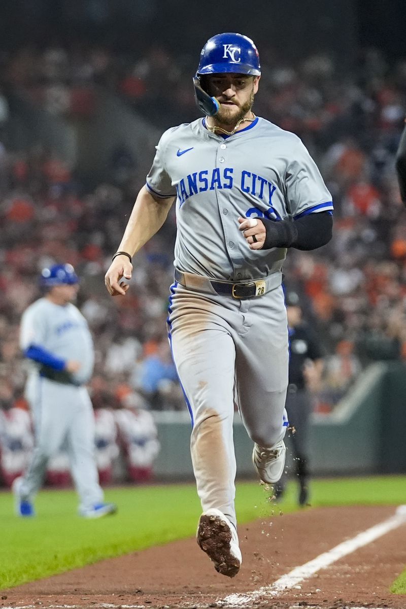 Kansas City Royals' Kyle Isbel scores on an infield single by Bobby Witt Jr. during the sixth inning in Game 2 of an AL Wild Card Series baseball game against the Baltimore Orioles, Wednesday, Oct. 2, 2024 in Baltimore. (AP Photo/Stephanie Scarbrough)