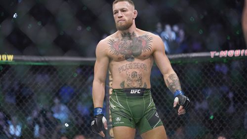 FILE - Conor McGregor prepares to fight Dustin Poirier in a UFC 264 lightweight mixed martial arts bout July 10, 2021, in Las Vegas. McGregor will not compete in UFC 303 on Saturday, June 29, 2024, in Las Vegas. He has indicated he is injured. (AP Photo/John Locher, File)
