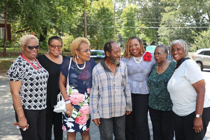 Emanuel Biggs stands surrounded by church members at First Iconium Baptist Church, which Emanuel sporadically attended. L to R: Valerie Baugh, Renekia Strother, Cynthia Williams, Emanuel Biggs, Erica D. Woods, Cynthia H. Davis and Denia Dixon.