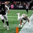 Atlanta Falcons linebacker Troy Andersen (44) runs into the end zone on an interception against the New Orleans Saints during the first half of an NFL football game, Sunday, Sept. 29, 2024, in Atlanta. (AP Photo/John Bazemore)