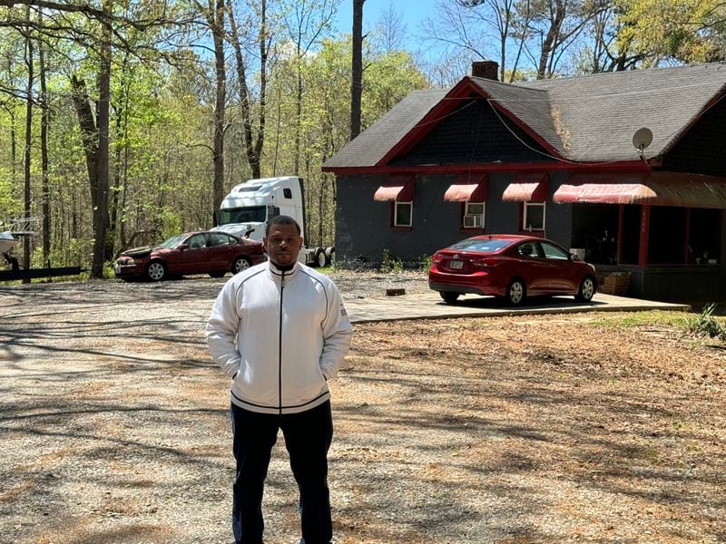 Steven Mack stands on the property he grew up on in South Fulton. His property is adjacent to NextEra Energy Resources land. Credit Adrianne Murchison
