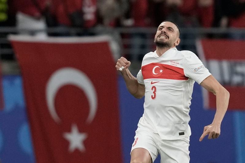 Turkey's Merih Demiral celebrates scoring his side's opening goal against Austria during a round of sixteen match at the Euro 2024 soccer tournament in Leipzig, Germany, Tuesday, July 2, 2024. (AP Photo/Thanassis Stavrakis)
